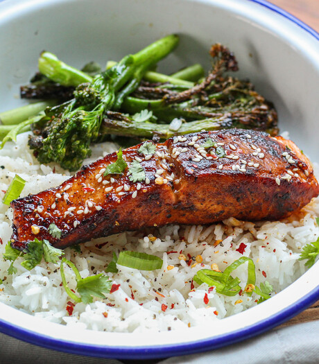 Salmon in sticky cajun honey sauce with green veg 